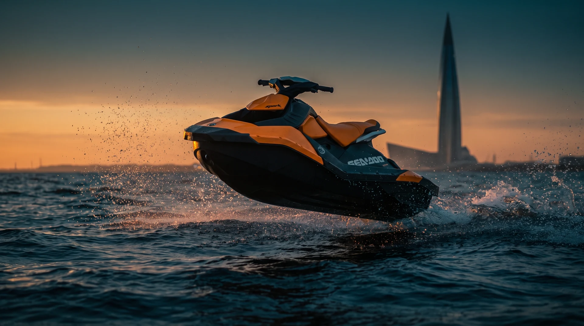 Оранжевый Sea-Doo Spark над водой Финского залива, на фоне — Лахта Центр
